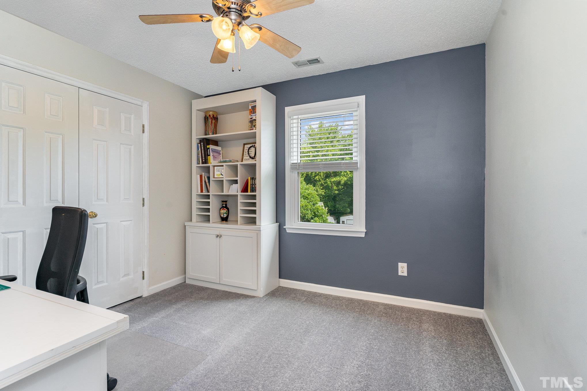 616 Jordan Ridge Lane Raleigh, NC 27603 - Photo 21 of 31 a view of an empty room with a window