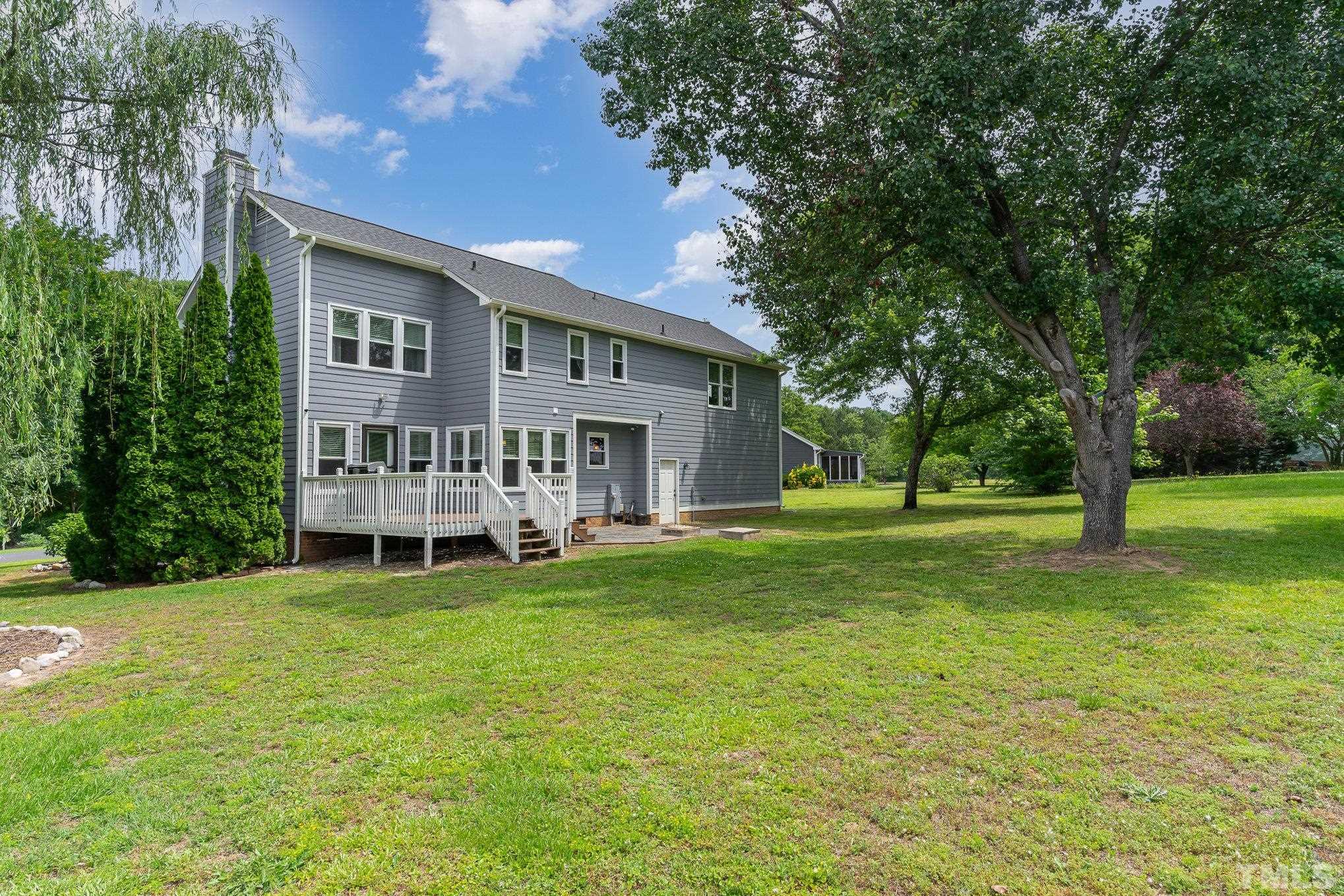616 Jordan Ridge Lane Raleigh, NC 27603 - Photo 29 of 31 a view of a house with a yard