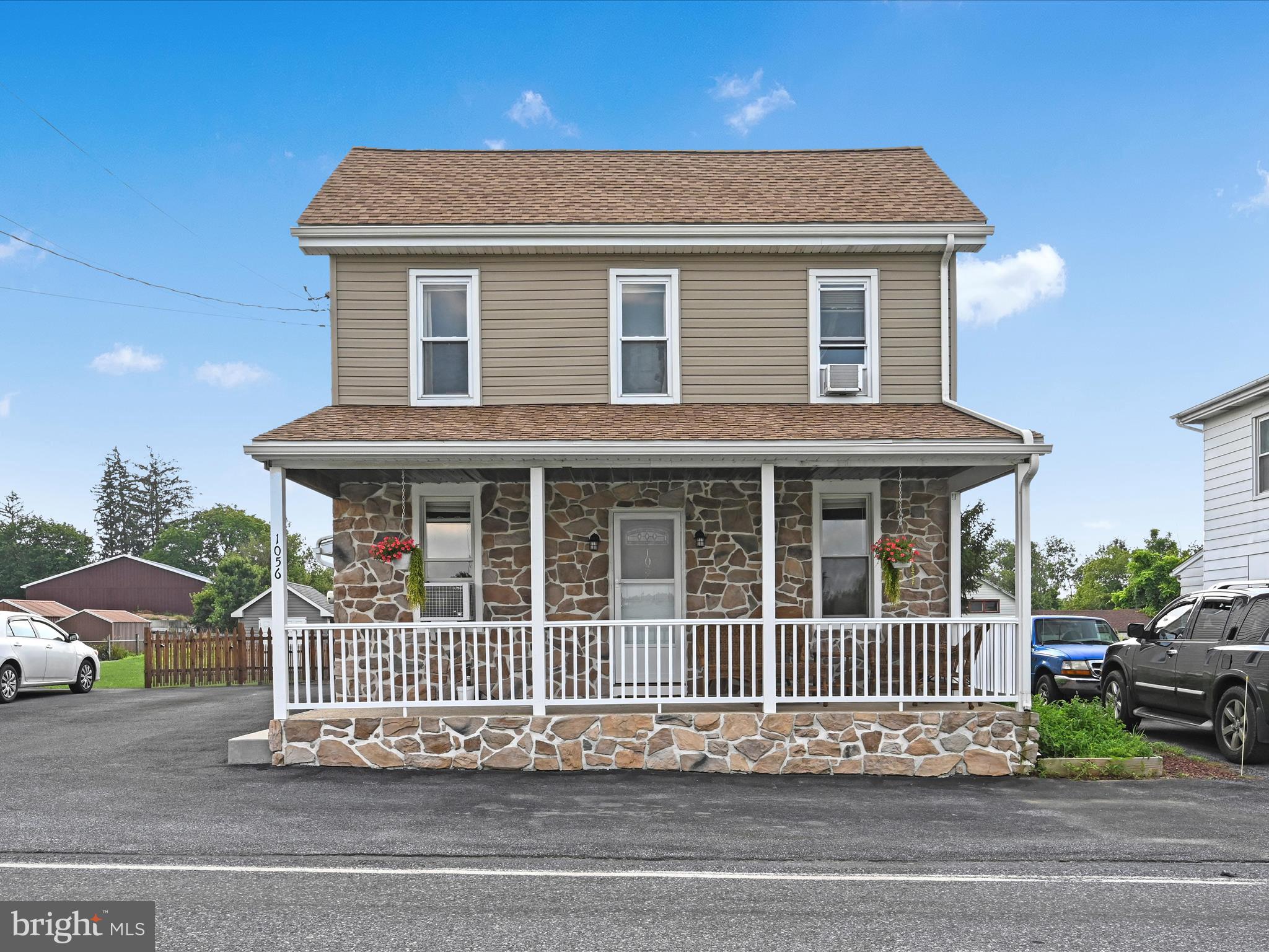 1056 Bellaire Road Elizabethtown, PA 17022 - Photo 1 of 30 a porch area with a deck