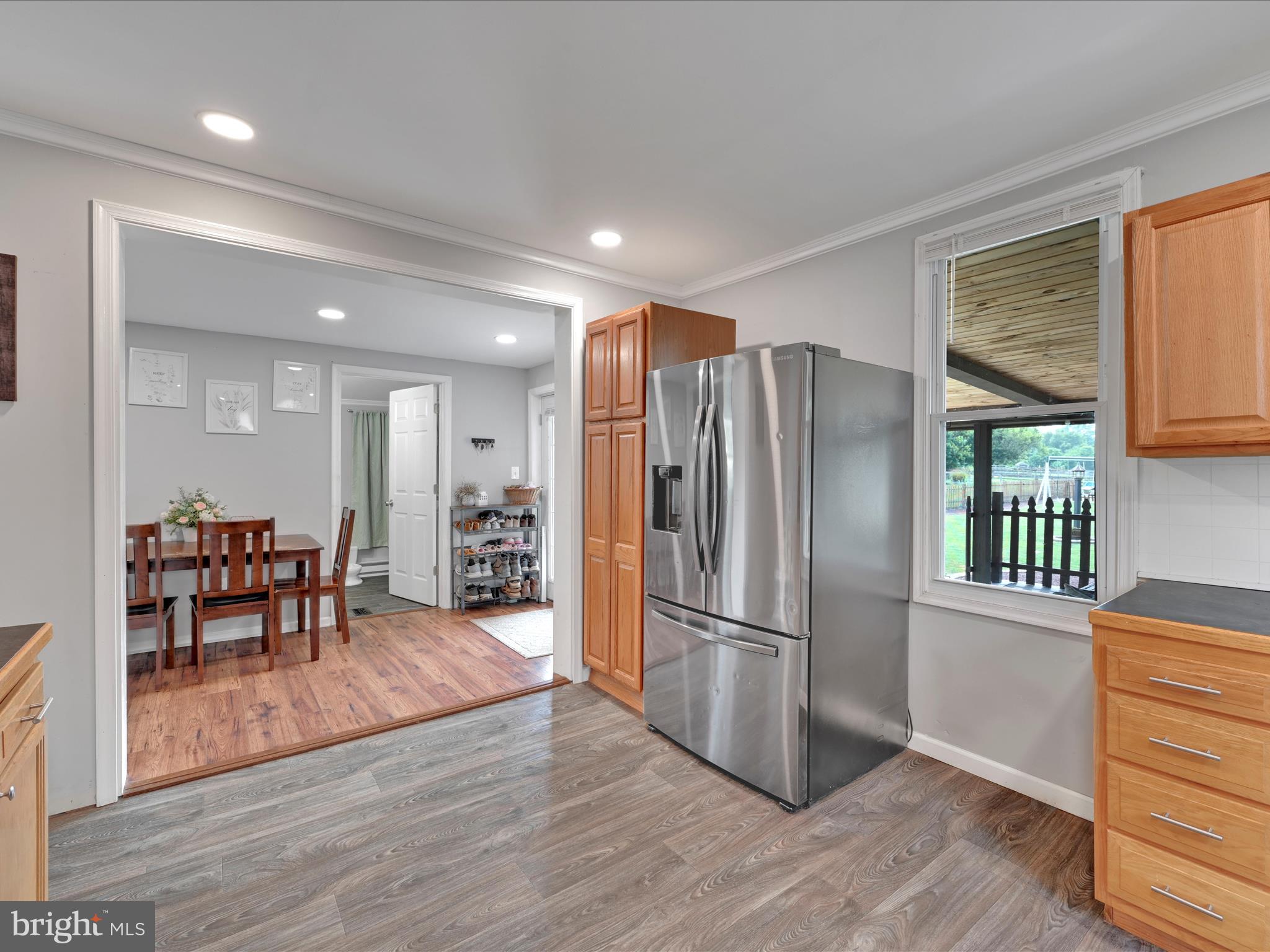 1056 Bellaire Road Elizabethtown, PA 17022 - Photo 13 of 30 a kitchen with stainless steel appliances a refrigerator and wooden floor