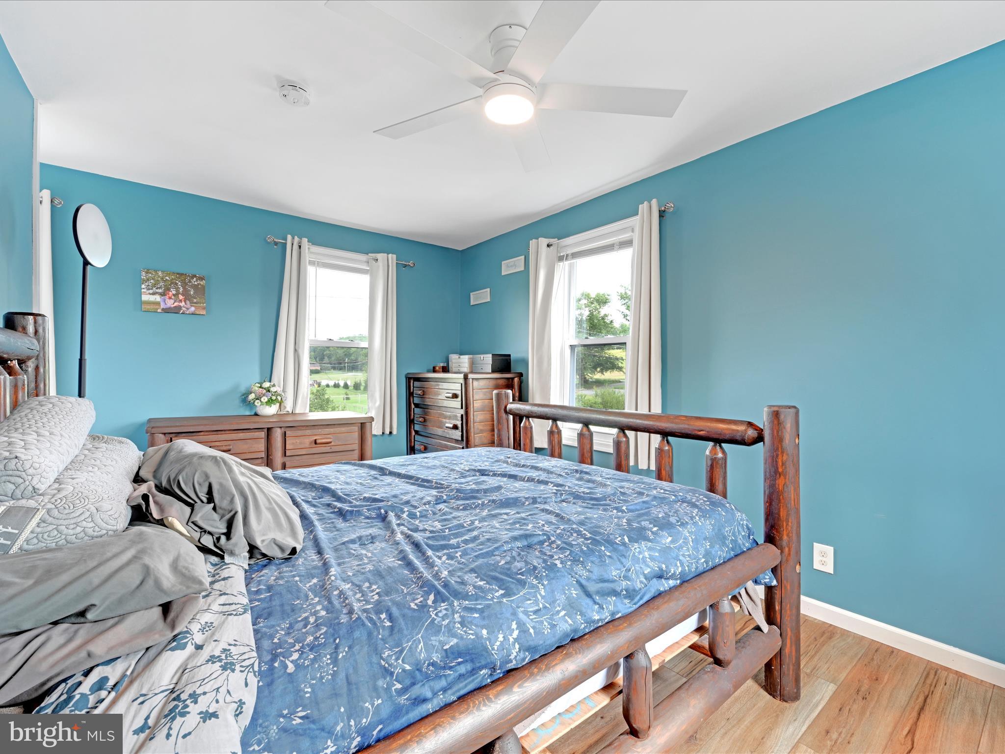 1056 Bellaire Road Elizabethtown, PA 17022 - Photo 16 of 30 a bedroom with a bed window and a table in it