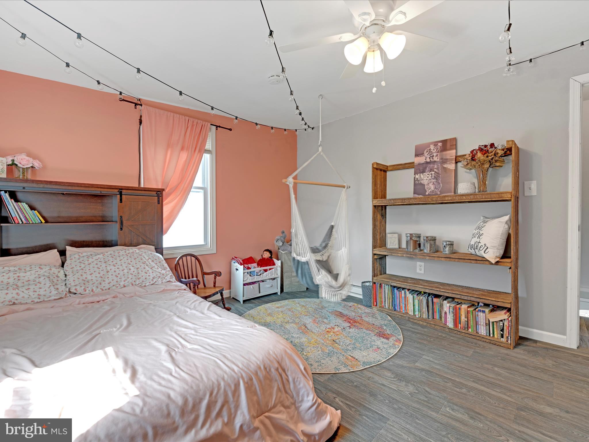 1056 Bellaire Road Elizabethtown, PA 17022 - Photo 19 of 30 a bedroom with bed and wooden floor