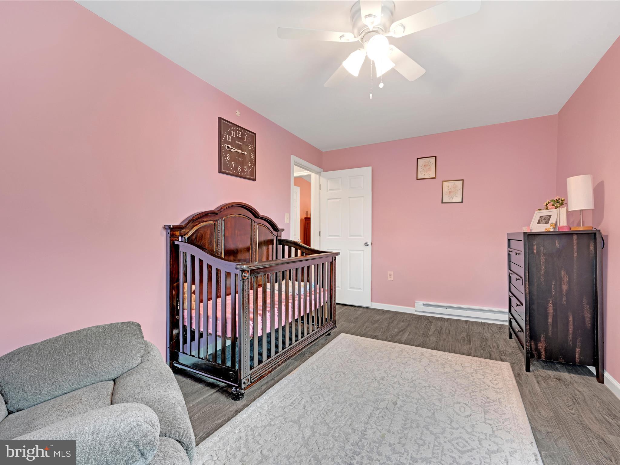 1056 Bellaire Road Elizabethtown, PA 17022 - Photo 21 of 30 a bedroom with furniture and wooden floor