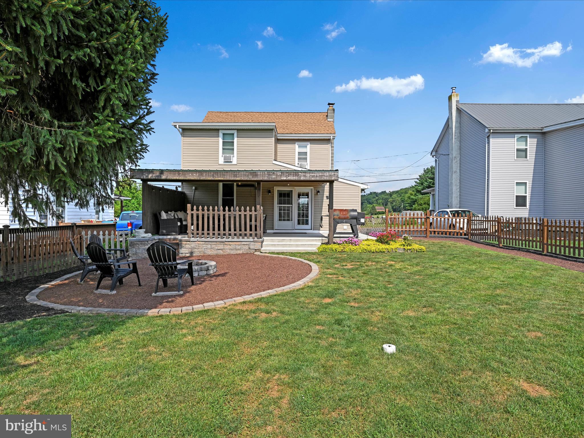 1056 Bellaire Road Elizabethtown, PA 17022 - Photo 24 of 30 a view of a house with backyard porch and sitting area