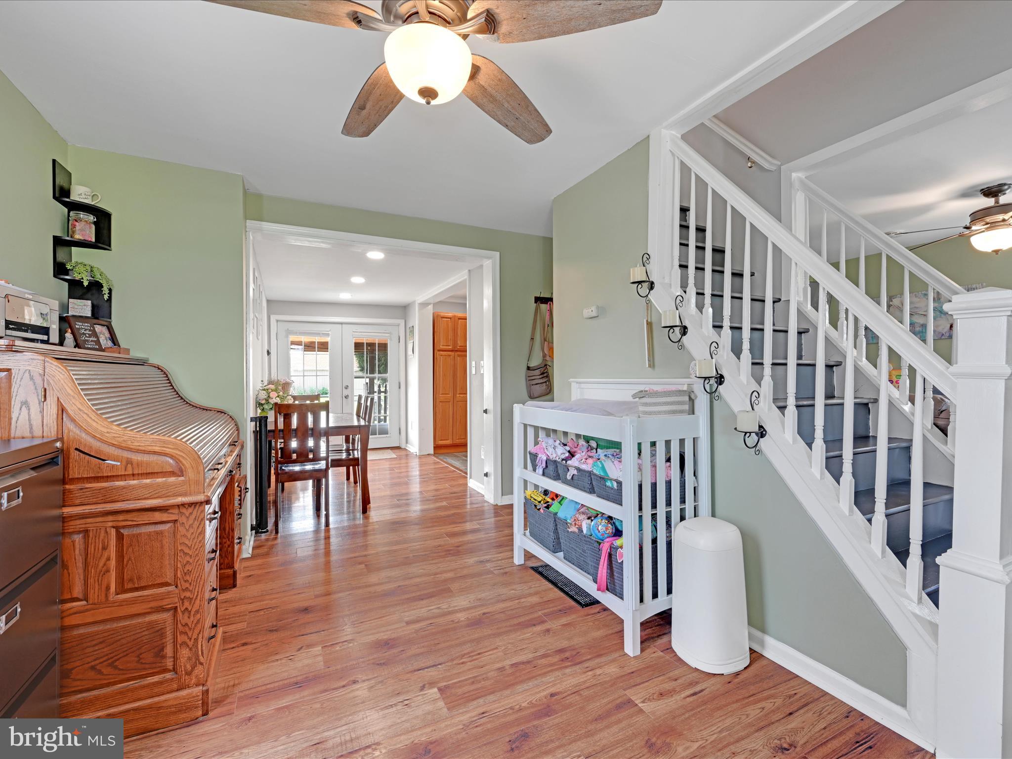 1056 Bellaire Road Elizabethtown, PA 17022 - Photo 5 of 30 a dining room with furniture entryway and wooden floor