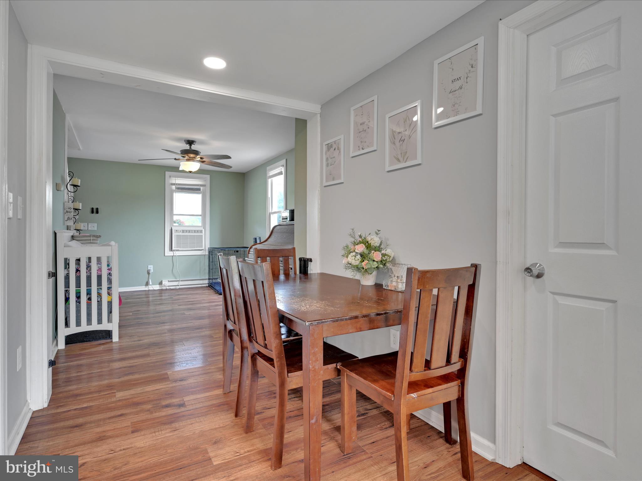1056 Bellaire Road Elizabethtown, PA 17022 - Photo 8 of 30 a view of a dining room with furniture and wooden floor