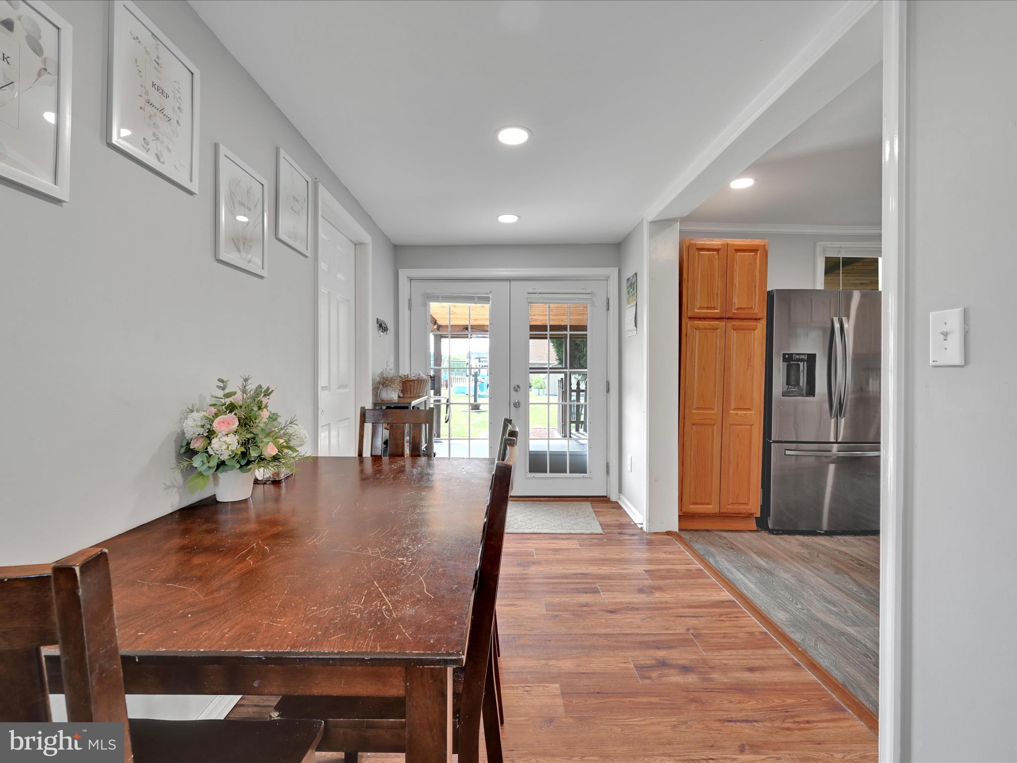 1056 Bellaire Road Elizabethtown, PA 17022 - Photo 9 of 30 a dining room with furniture and wooden floor