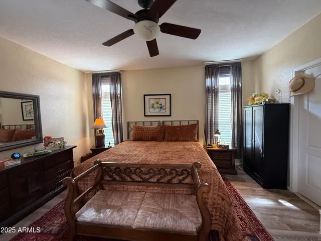 a kitchen with a sink appliances and cabinets