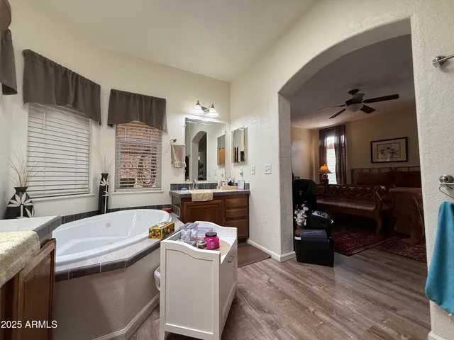 a kitchen with a refrigerator and a sink