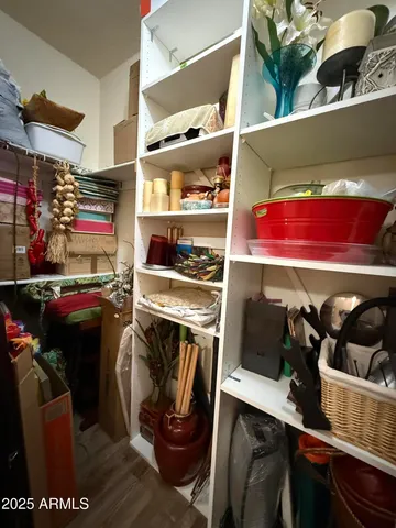 a bathroom with a sink vanity mirror and toilet