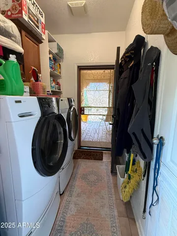 a living room filled with furniture and a table