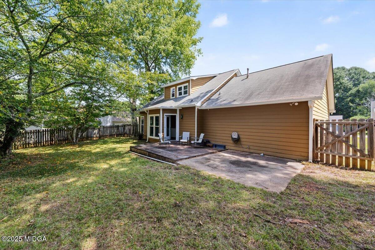 117 Chadwick Drive Macon, GA 31210 - Photo 26 of 32 a view of house with backyard and trees