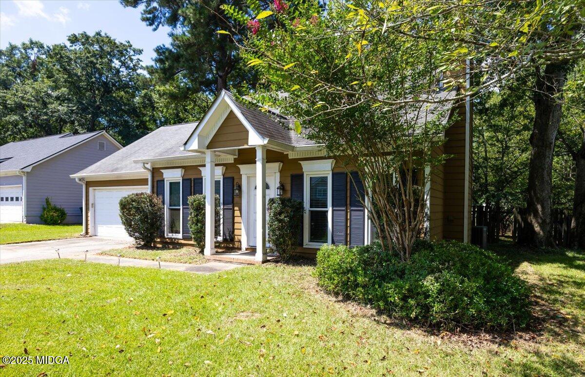 117 Chadwick Drive Macon, GA 31210 - Photo 3 of 32 a front view of a house with a yard