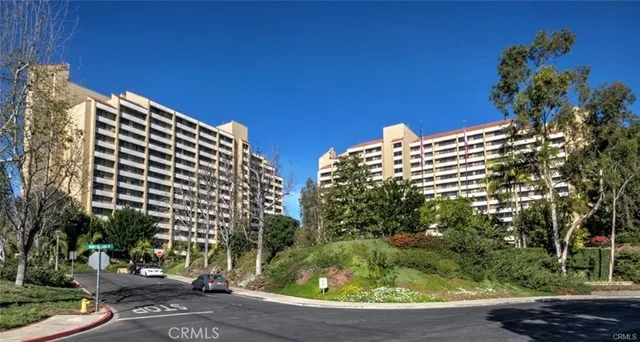a view of building with a tree