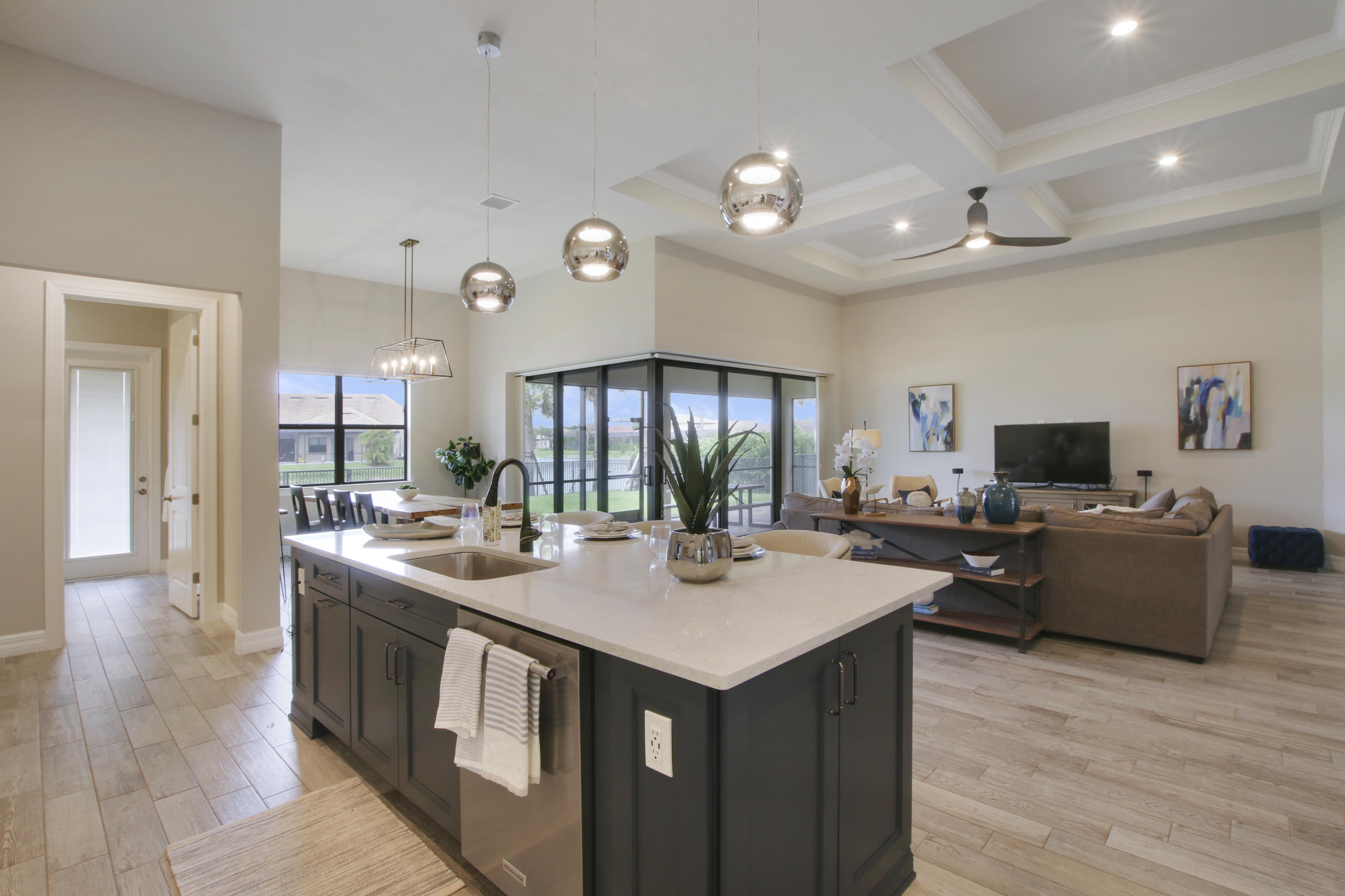 126 Indigo River Point Jupiter, FL 33478 - Photo 13 of 59 Kitchen Island looking into Living Space