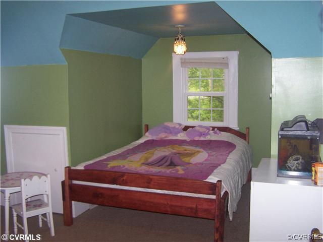 13900 Harrowgate Road Chester, VA 23831 - Photo 6 of 7 a bedroom with a bed and a window