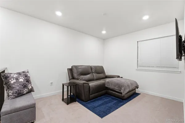 a living room with furniture and a couch