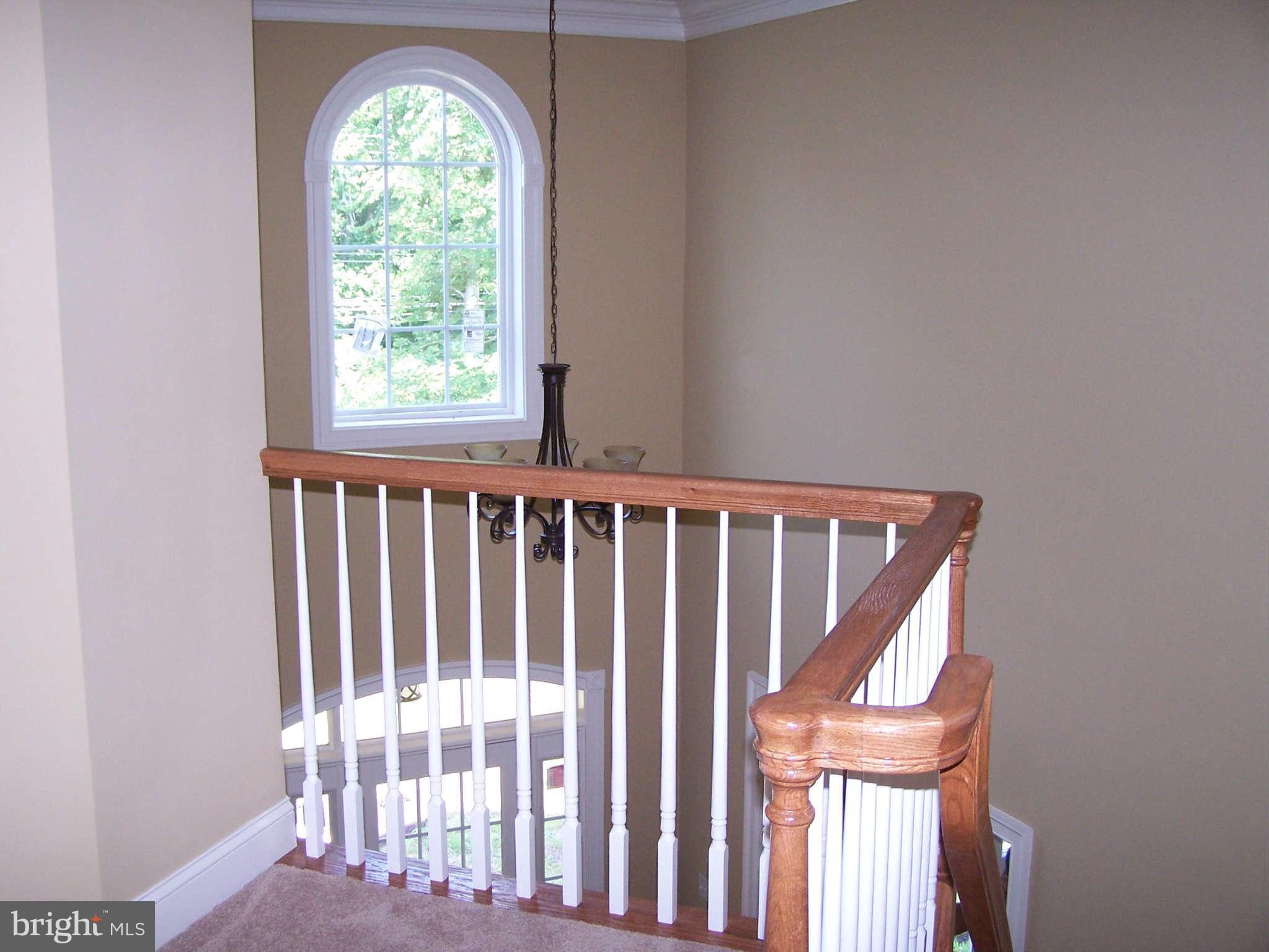 2574 Davidsonville Road Gambrills, MD 21054 - Photo 11 of 25 Two Story Foyer with Arched Window
