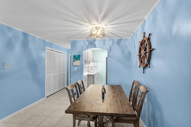 a kitchen with granite countertop a cabinets and fireplace