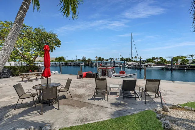 a view of a swimming pool with a lounge chair