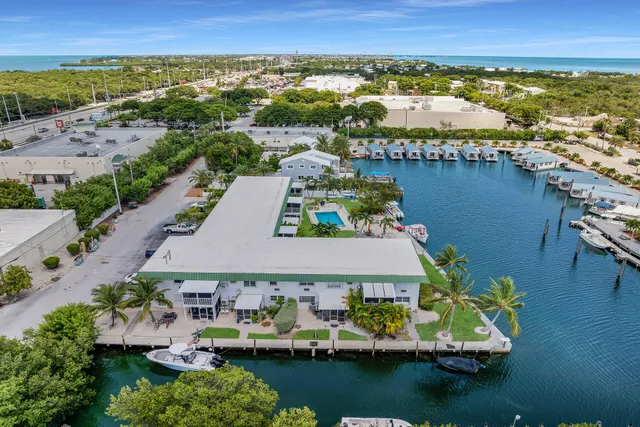 an aerial view of a city with houses