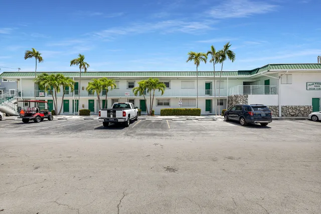 a terrace with outdoor seating and city view