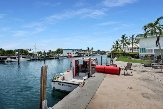 a kitchen that has a microwave and a stove