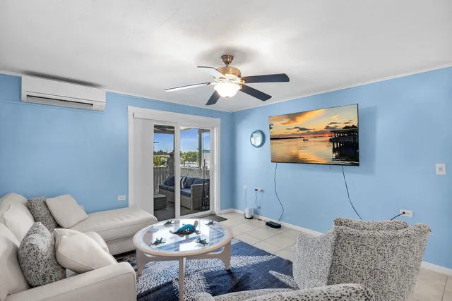 a living room with furniture and window