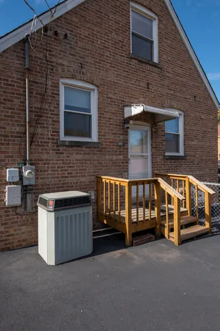 a view of a house with a street