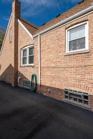 a view of a house with a street