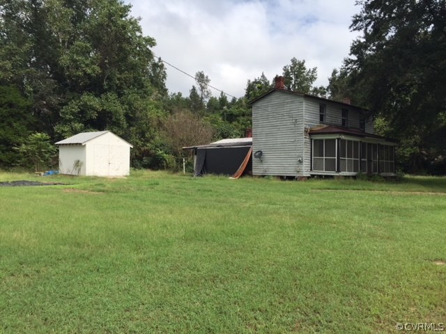367 Harris Road Aylett, VA 23009 - Photo 3 of 6 a view of a house with backyard and trees