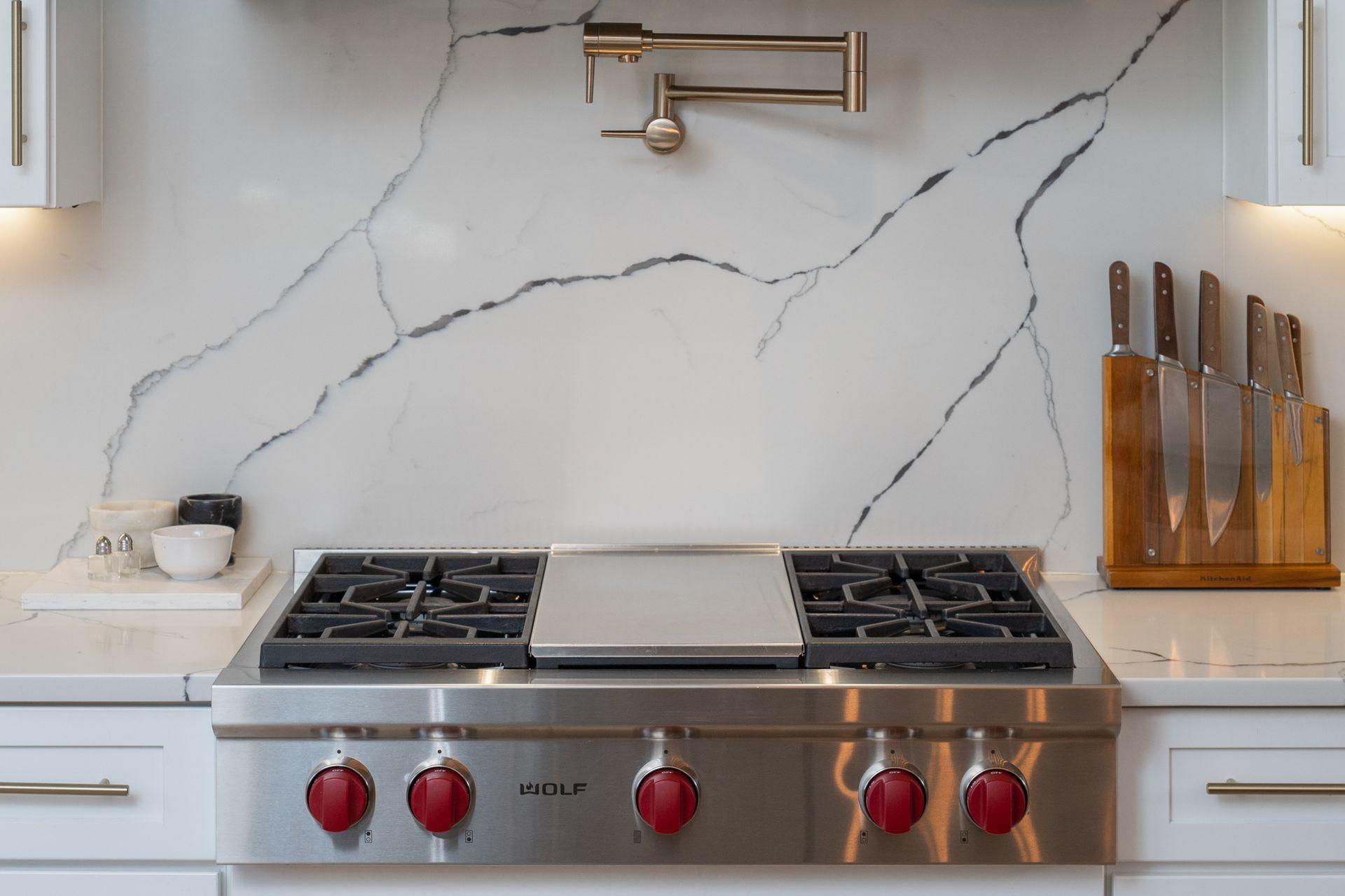 716 Cheese Spring Road New Canaan, CT 06840 - Photo 12 of 56 a stove top oven sitting inside of a kitchen