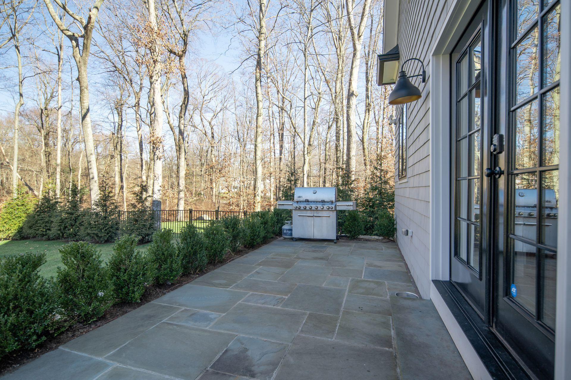 716 Cheese Spring Road New Canaan, CT 06840 - Photo 21 of 56 a view of a pathway with a backyard of the house