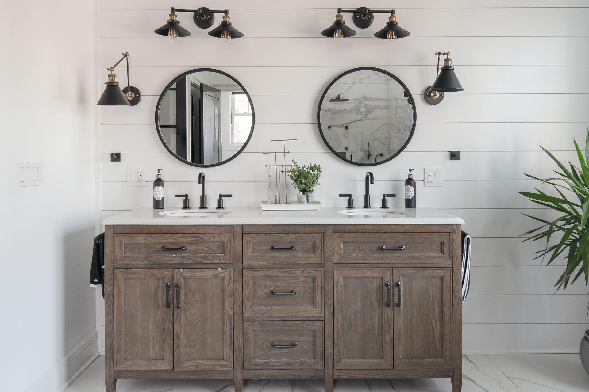 716 Cheese Spring Road New Canaan, CT 06840 - Photo 29 of 56 a bathroom with a granite countertop double vanity sink and a mirror