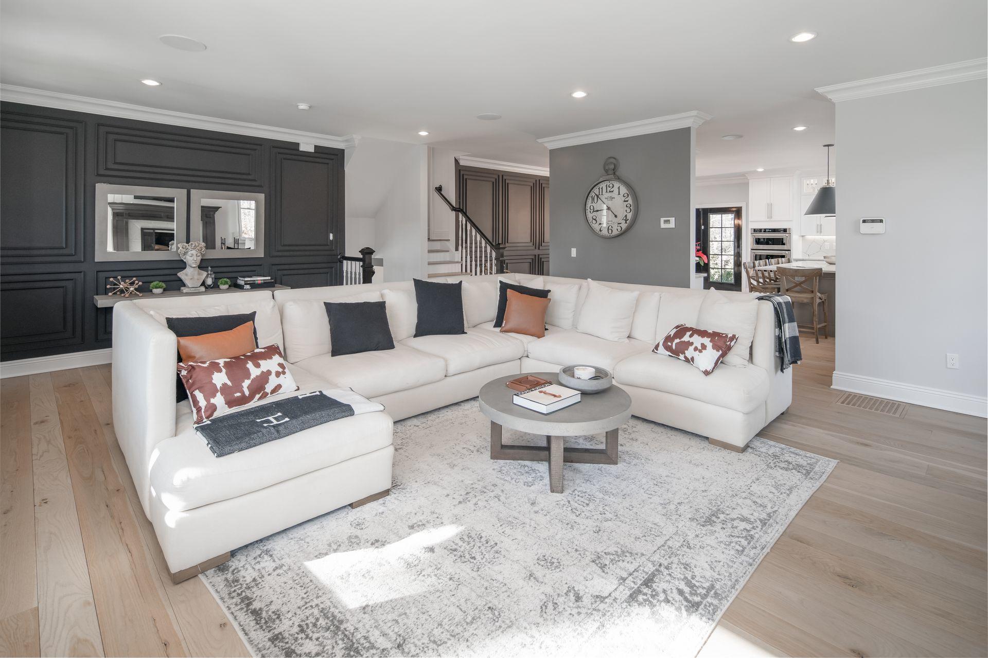 716 Cheese Spring Road New Canaan, CT 06840 - Photo 4 of 56 a living room with furniture and view of kitchen