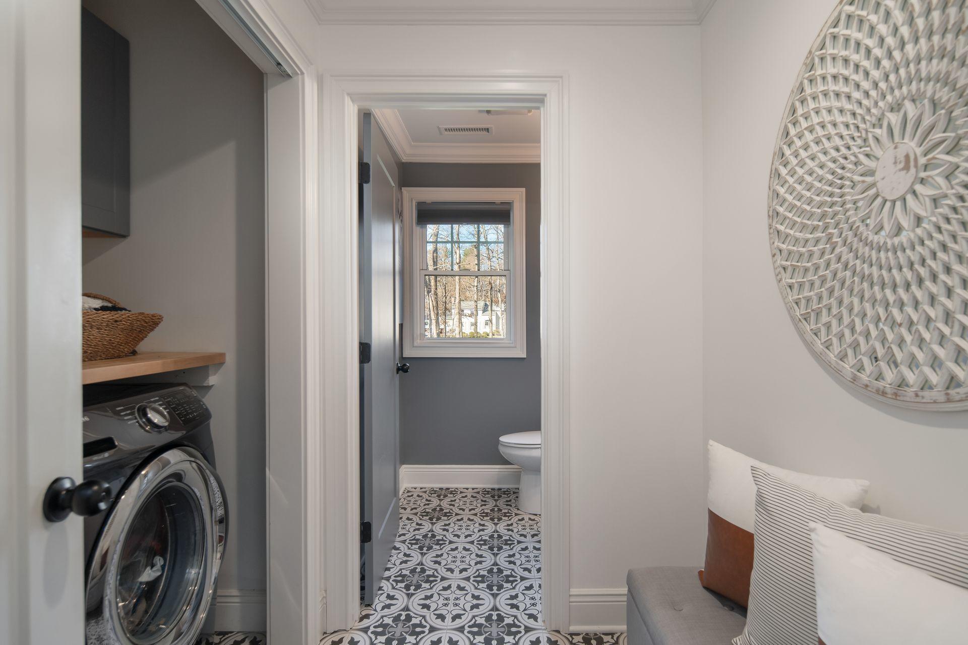 716 Cheese Spring Road New Canaan, CT 06840 - Photo 38 of 56 a bathroom with a toilet and a sink