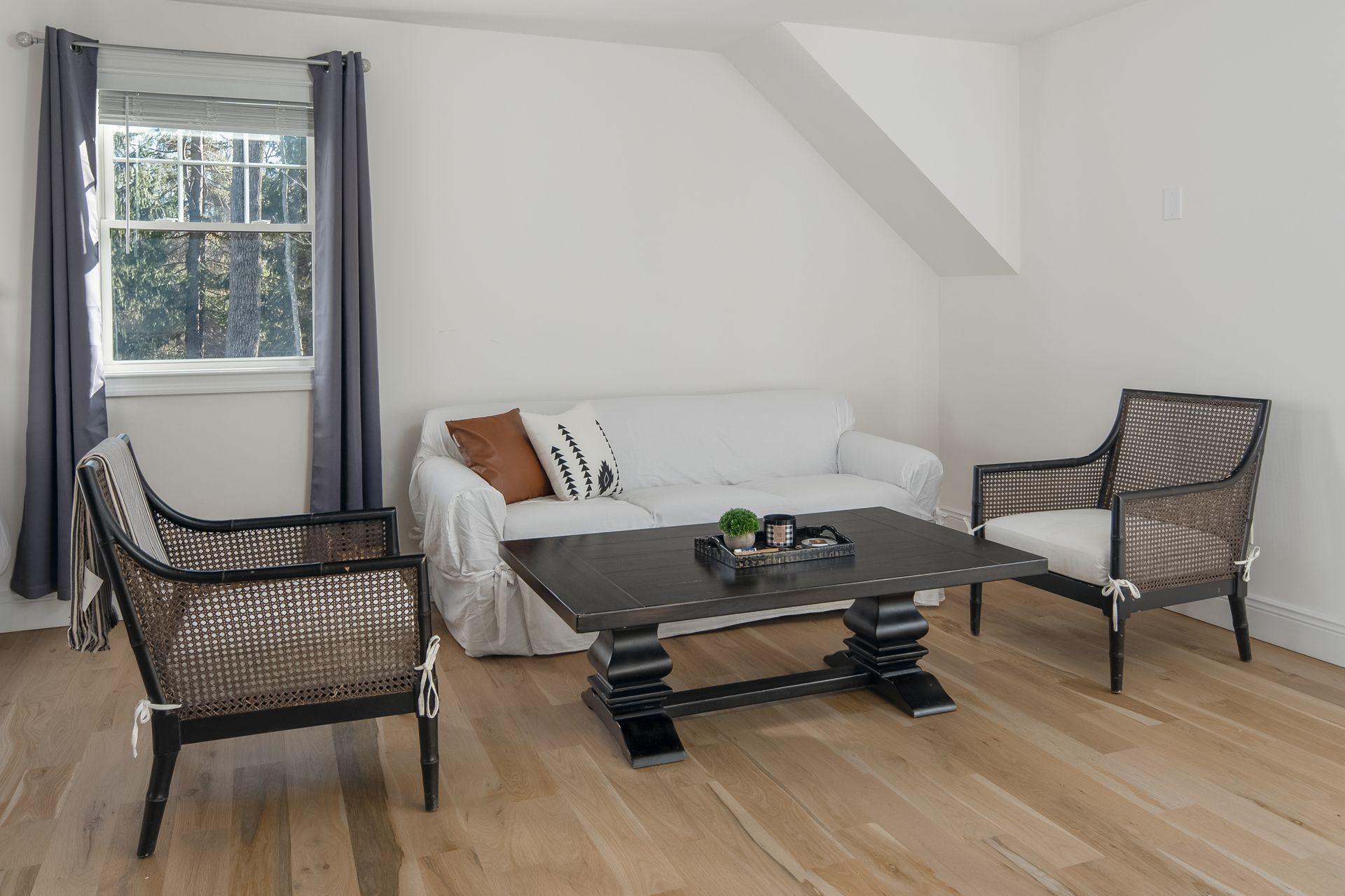 716 Cheese Spring Road New Canaan, CT 06840 - Photo 43 of 56 a living room with furniture and a window