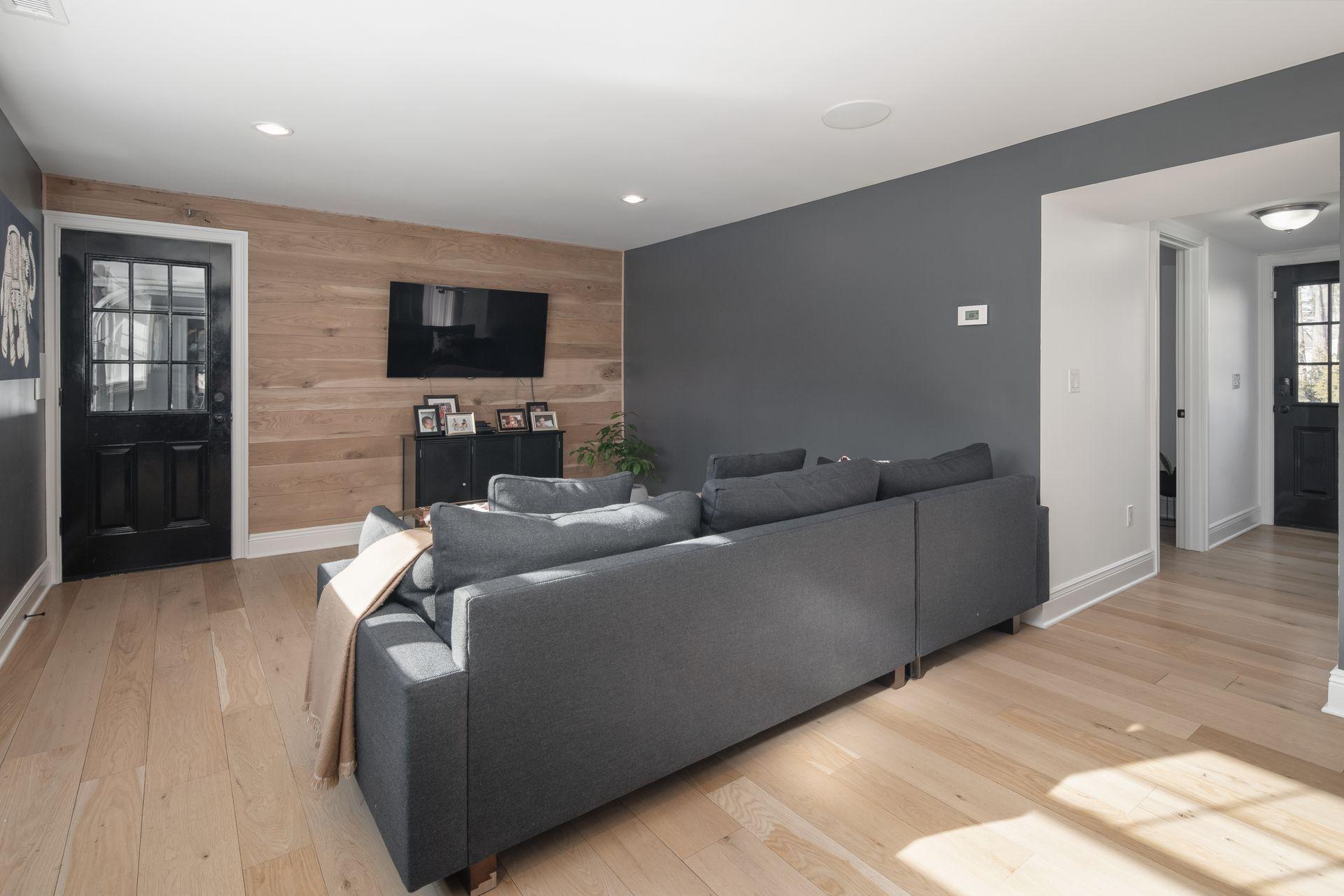 716 Cheese Spring Road New Canaan, CT 06840 - Photo 10 of 56 a living room with furniture and a flat screen tv