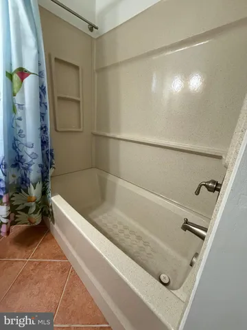 a bathroom with a tub