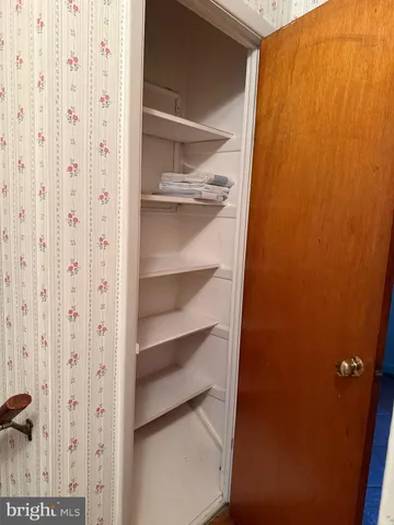 a view of a room with rack on the wall