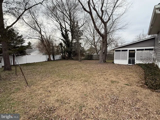 a house with trees in front of it