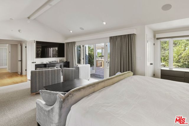 a bathroom with a sink a mirror and a bathtub
