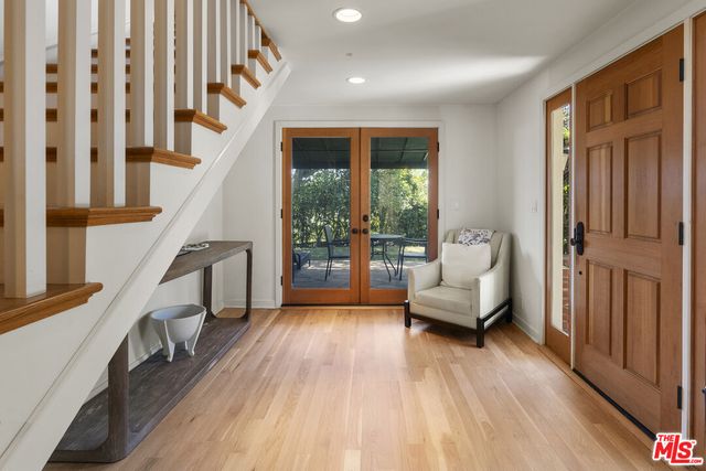 a kitchen with stainless steel appliances granite countertop a stove and a refrigerator