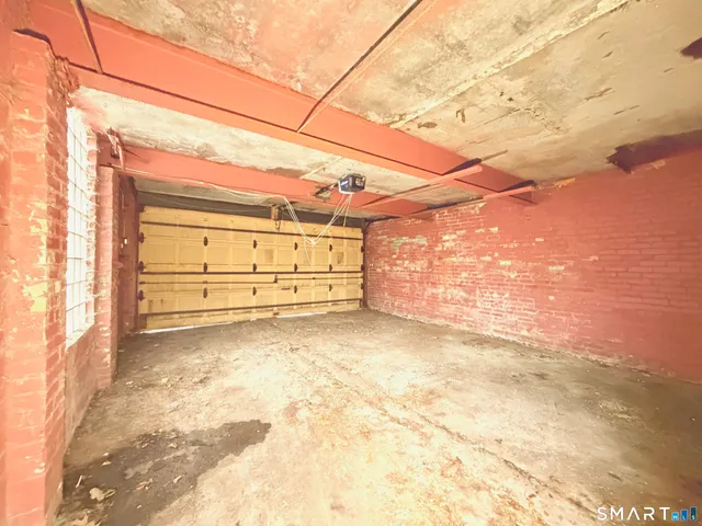 a view of a room with a wooden floor