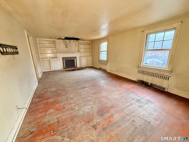 an empty room with windows