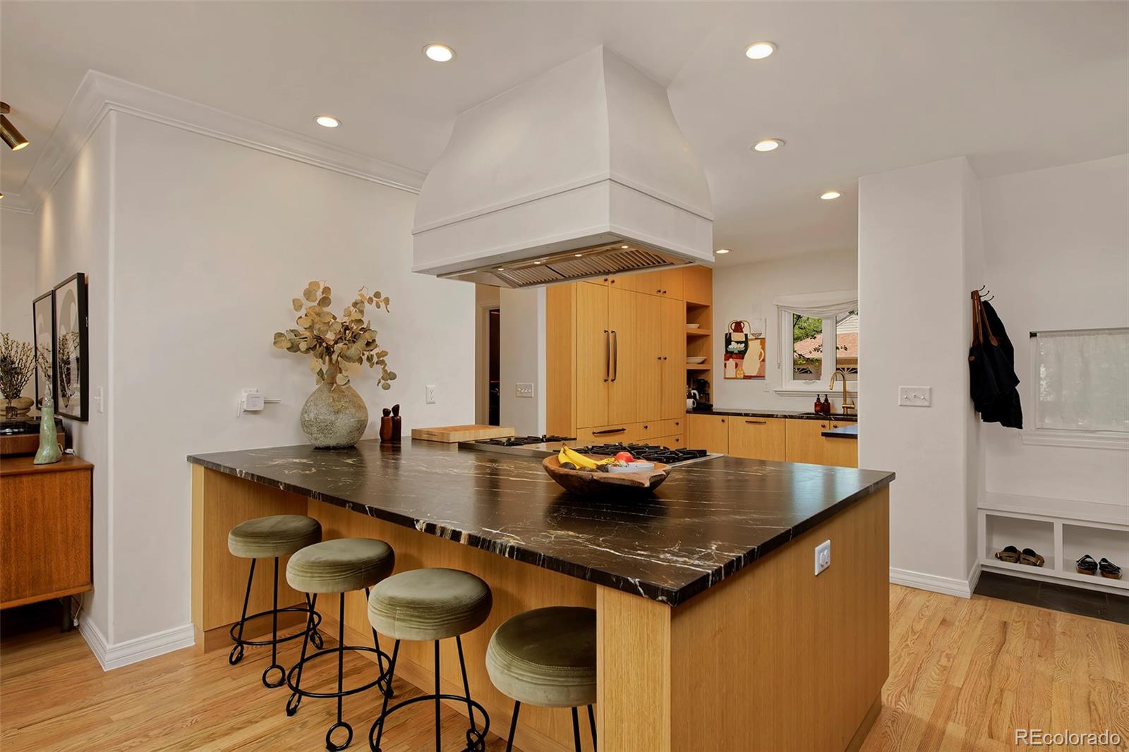 590 Race Street Denver, CO 80206 - Photo 18 of 50 a kitchen with stainless steel appliances granite countertop a sink a stove and a refrigerator