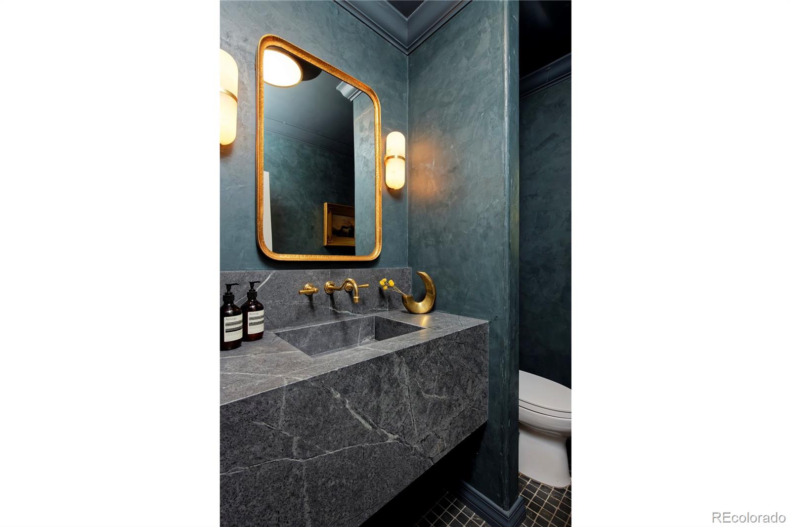 590 Race Street Denver, CO 80206 - Photo 23 of 50 a bathroom with a sink and a mirror
