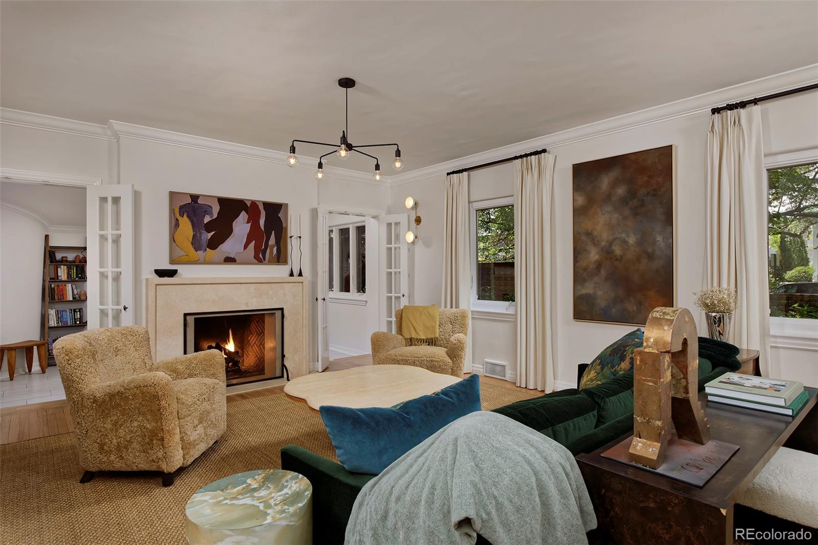 590 Race Street Denver, CO 80206 - Photo 7 of 50 a living room with furniture and a fireplace