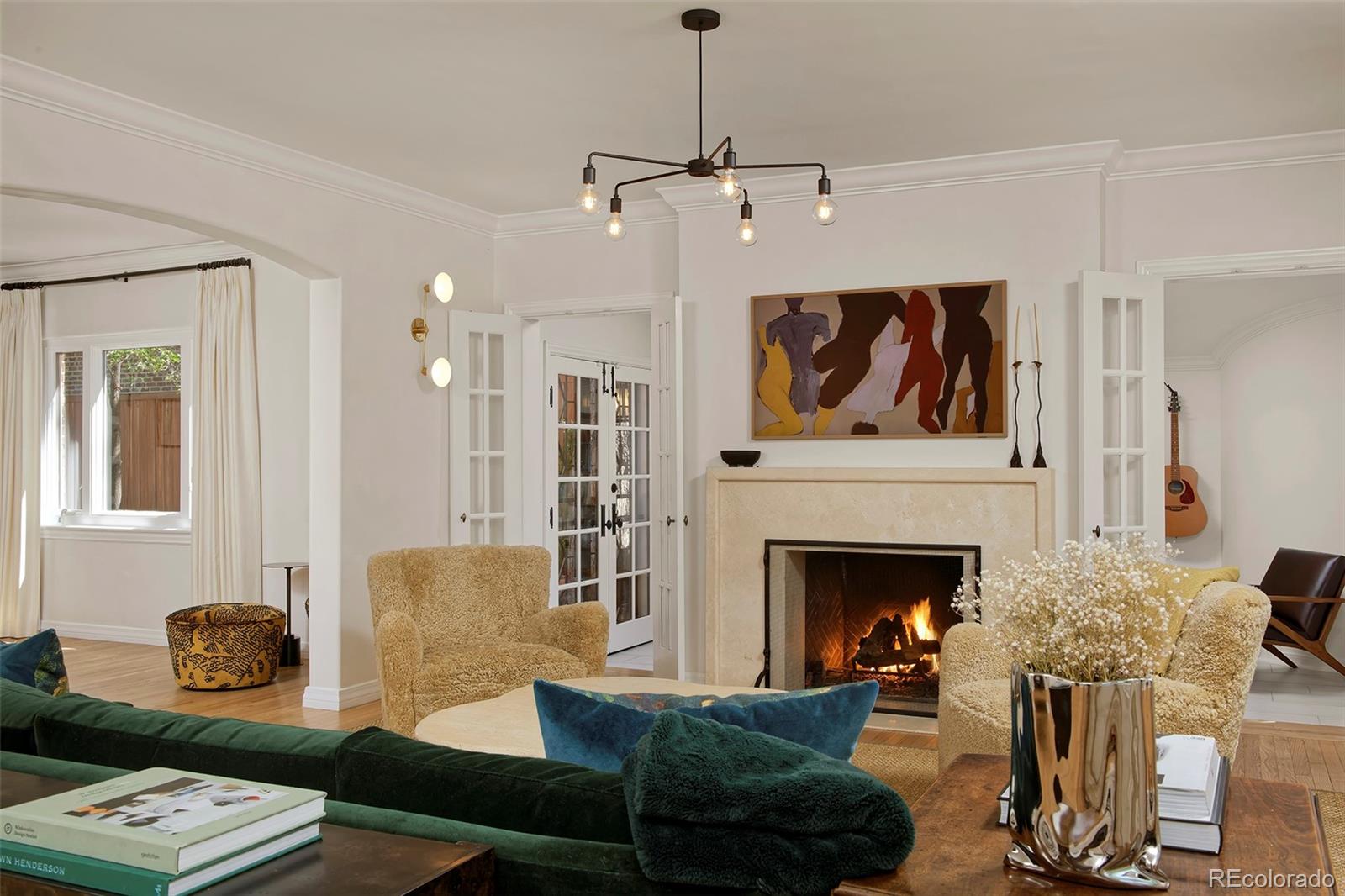590 Race Street Denver, CO 80206 - Photo 8 of 50 a living room with furniture and a fireplace