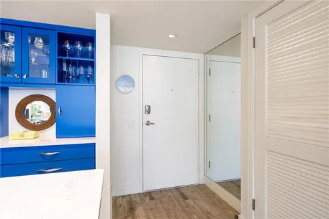 a view of entryway with wooden floor